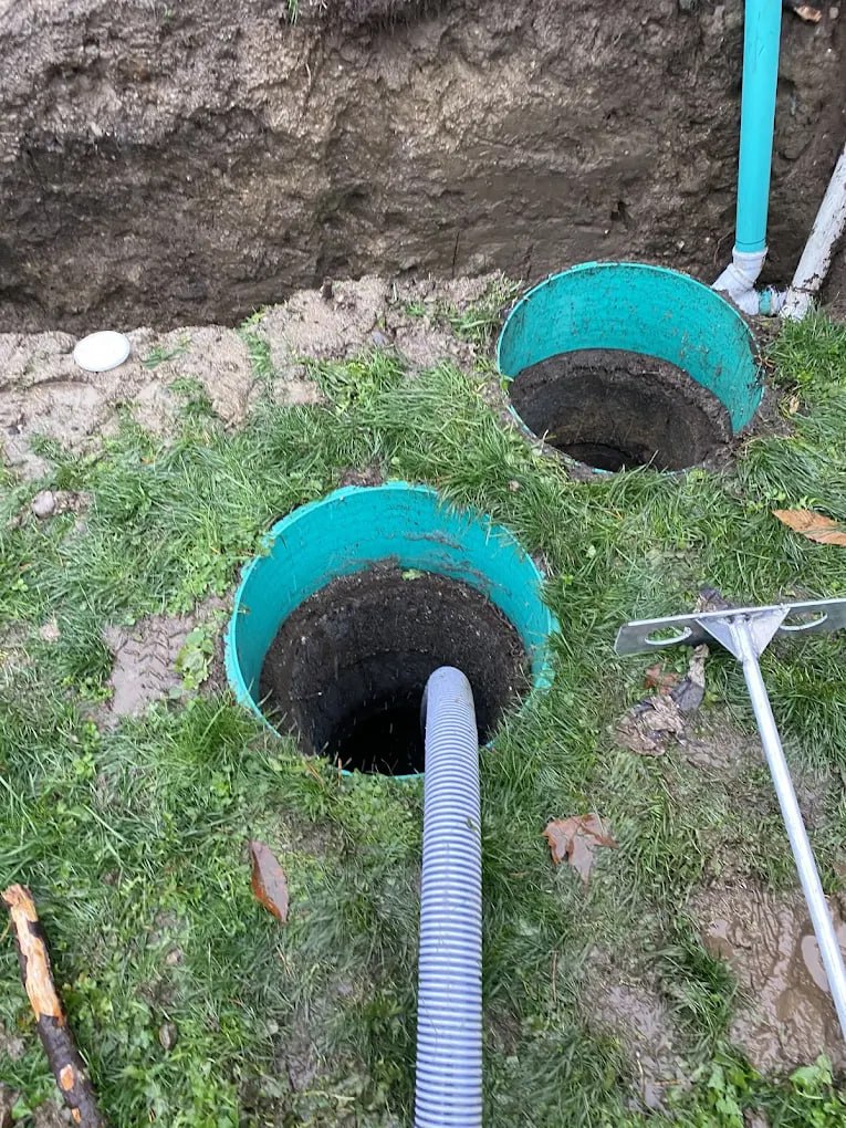 Dual septic tank being serviced
